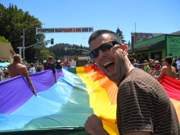 As part of the traditon, a giant rainbow flag is part of Gay Pride Parade.