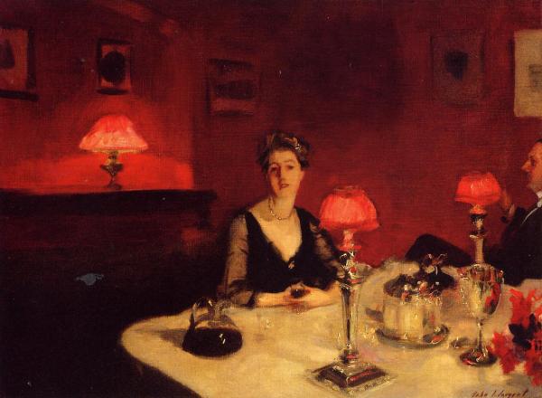 a-dinner-table-at-night-1884